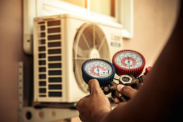 Professional Air Conditioning Service technician working in Williams, CA